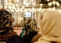 Women praying inside a mosque